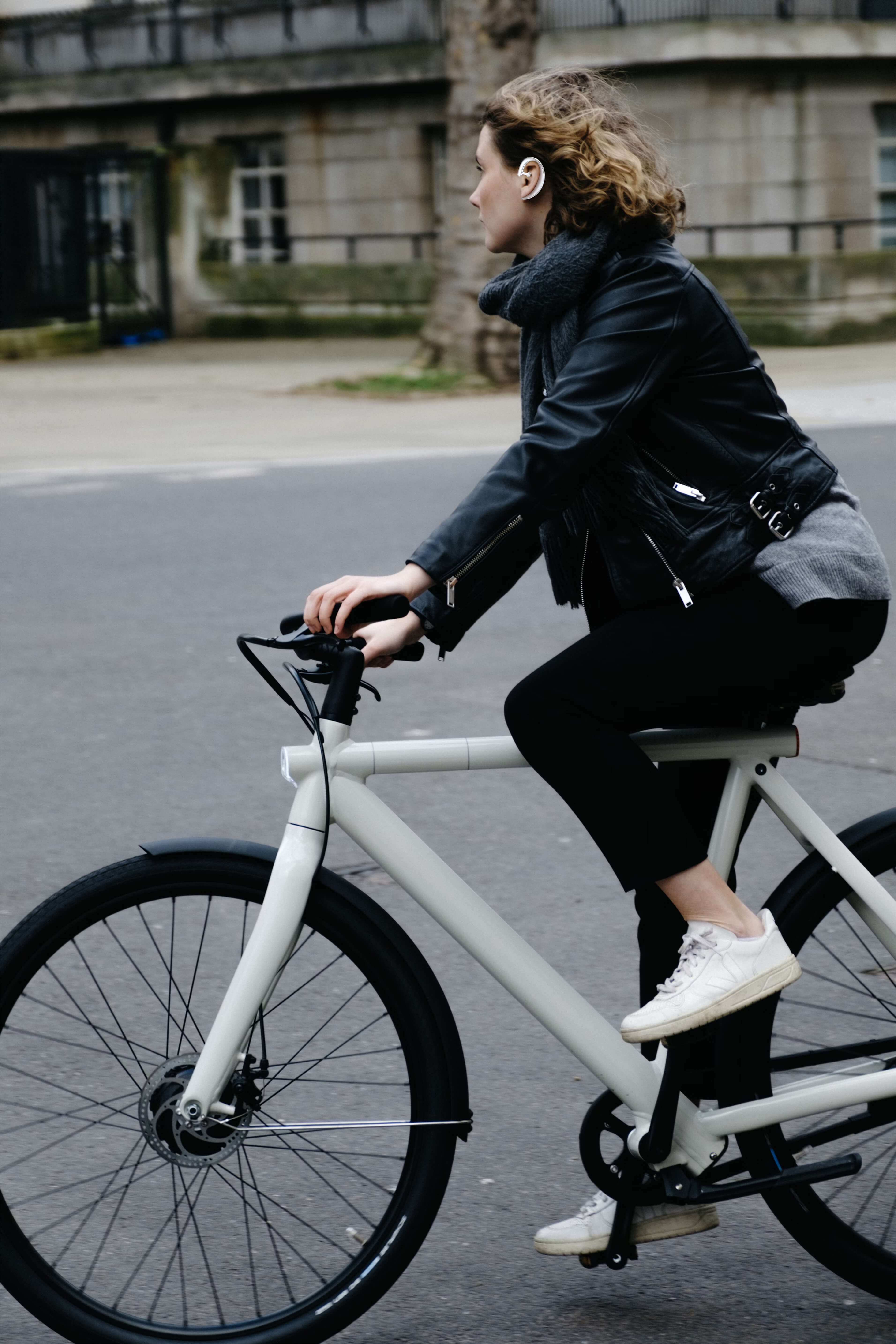 Woman wearing Sona riding bike